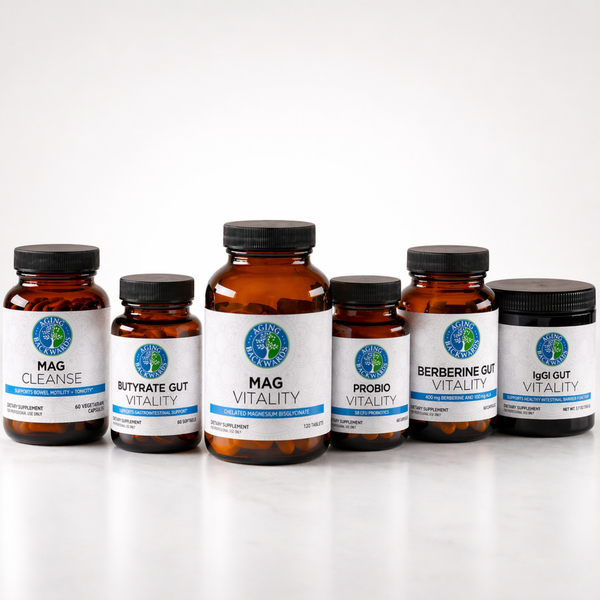 Row of supplement bottles with labels on a white reflective background